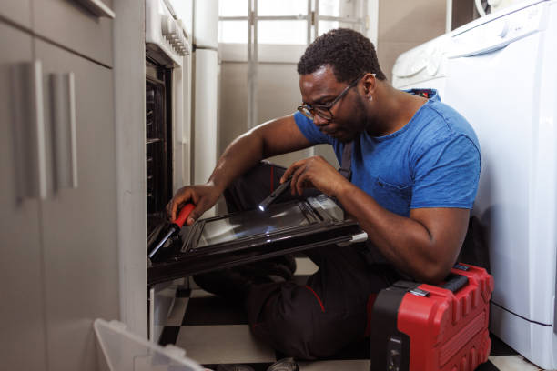 Young African American man working in a client's home